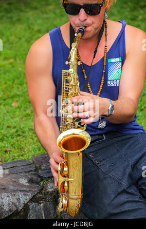 Local man playing saxophone in Colonia del Sacramento, Uruguay. It is one of the oldest towns in Uruguay Stock Photo