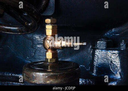 Various mechanisms and metal pipes from a Industrial Factory Stock Photo