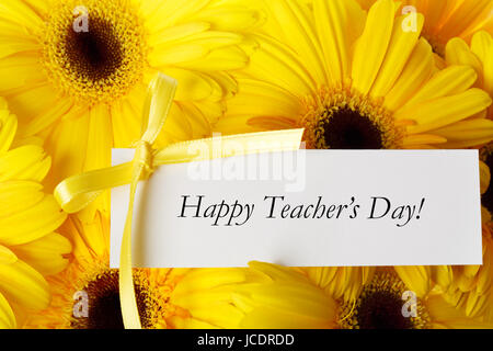 Happy Teachers Day message with yellow gerberas Stock Photo