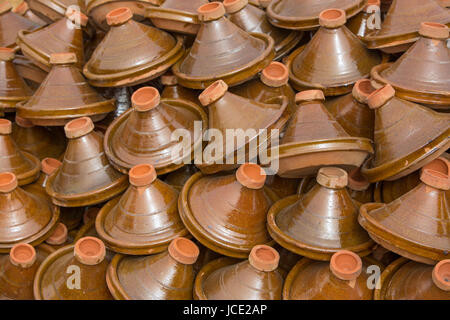 Selection of brown Moroccan tajines (traditional casserole dishes) found at the market Stock Photo