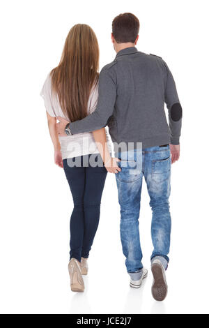 sweet-partners-hold-each-others-hands-while-walking-jce2j7.jpg