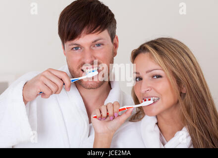 They brushed teeth together before taking shower. Stock Photo