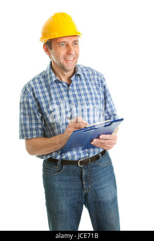 Confident worker wearing hard hat and taking notes. Isolated on white Stock Photo