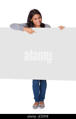 Young Woman Holding Placard. Isolated On White Stock Photo