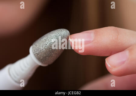 Close-up Photo Of A Hand Manicuring Nails Stock Photo