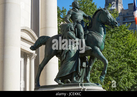 NEW YORK - SEPTEMBER 13: President Theodore Roosevelt equestrian statue in front of American Museum of Natural History in a sunny day, blue sky Stock Photo