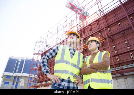Two smiling construction workers Stock Photo