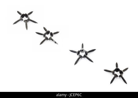 Five-pointed stars lined diagonally with Oxidized self-tapping screw isolated on white background Stock Photo