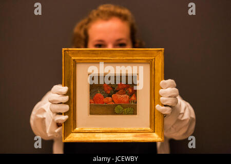 London, UK. 15 June 2017. A Sotheby's technician presents the artwork Strawberries by Lucian Freud, circa 1950. Estimate GBP 550,000-750,000. Auction house Sotheby's presents Actual Size, a curated evening sale on 21 June 2017. Stock Photo