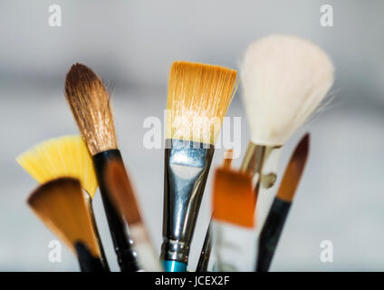 Various artists paint brushes of different sizes and shapes Stock Photo