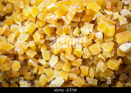 Pile of Dried and Candied Mango Close Up Background. Healthy Eating. Stock Photo