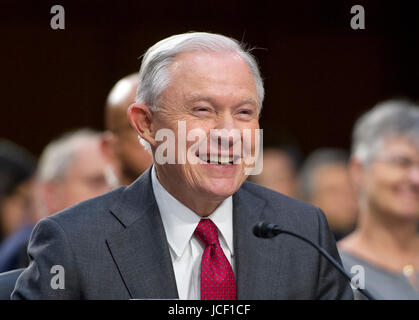 United States Attorney General Jeff Sessions smiles after giving testimony before the US Senate Select Committee on Intelligence to 'examine certain intelligence matters relating to the 2016 United States election' on Capitol Hill in Washington, DC on Tuesday, June 13, 2017. In his prepared statement Attorney General Sessions said it was an 'appalling and detestable lie' to accuse him of colluding with the Russians. Credit: Ron Sachs/CNP (RESTRICTION: NO New York or New Jersey Newspapers or newspapers within a 75 mile radius of New York City) - NO WIRE SERVICE - Photo: Ron Sachs/Consolidat Stock Photo