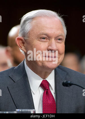 United States Attorney General Jeff Sessions smiles after giving testimony before the US Senate Select Committee on Intelligence to 'examine certain intelligence matters relating to the 2016 United States election' on Capitol Hill in Washington, DC on Tuesday, June 13, 2017. In his prepared statement Attorney General Sessions said it was an 'appalling and detestable lie' to accuse him of colluding with the Russians. Credit: Ron Sachs/CNP (RESTRICTION: NO New York or New Jersey Newspapers or newspapers within a 75 mile radius of New York City) - NO WIRE SERVICE - Photo: Ron Sachs/Consolidat Stock Photo