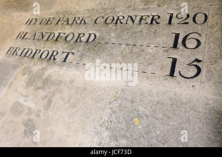 Dorchester, UK. 15th June, 2017. Eighteenth century sign, carved onto onto the wall of the old Shire Hall on the B3150 London Road, on a sunny day in Dorchester Credit: stuart fretwell/Alamy Live News Stock Photo