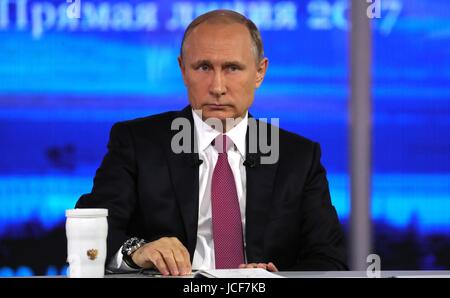 Moscow, Russia. 15th June, 2017. Russian President Vladimir Putin listens to a questions during his annual live televised call-in show dubbed A Direct Line With Putin June 15, 2017 in Moscow, Russia. During the show Putin blamed domestic U.S. problems for sanctions imposed on Russia. Credit: Planetpix/Alamy Live News Stock Photo
