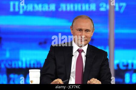 Moscow, Russia. 15th June, 2017. Russian President Vladimir Putin listens to a questions during his annual live televised call-in show dubbed A Direct Line With Putin June 15, 2017 in Moscow, Russia. During the show Putin blamed domestic U.S. problems for sanctions imposed on Russia. Credit: Planetpix/Alamy Live News Stock Photo