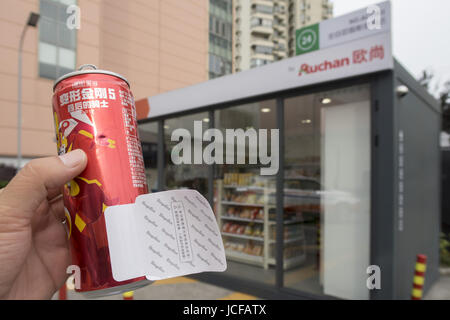 Shanghai, Shanghai, China. 16th June, 2017. Shanghai, CHINA-June 15 2017: (EDITORIAL USE ONLY. CHINA OUT) .The Bingo Box of Auchan, world's first 24 hours open self-service emergency store, opens in Shanghai, June 15th, 2017. Customers can enter the store after scan QR code and buy items at the store by themselves. The door of the store open automatically after customers pay through Wechat or Alipay. Credit: SIPA Asia/ZUMA Wire/Alamy Live News Stock Photo