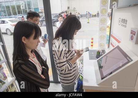 Shanghai, Shanghai, China. 16th June, 2017. Shanghai, CHINA-June 15 2017: (EDITORIAL USE ONLY. CHINA OUT) .The Bingo Box of Auchan, world's first 24 hours open self-service emergency store, opens in Shanghai, June 15th, 2017. Customers can enter the store after scan QR code and buy items at the store by themselves. The door of the store open automatically after customers pay through Wechat or Alipay. Credit: SIPA Asia/ZUMA Wire/Alamy Live News Stock Photo