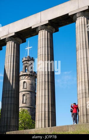 The Nelson Monument and National Monument on Calton Hill in Edinburgh, Scotland, United Kingdom Stock Photo