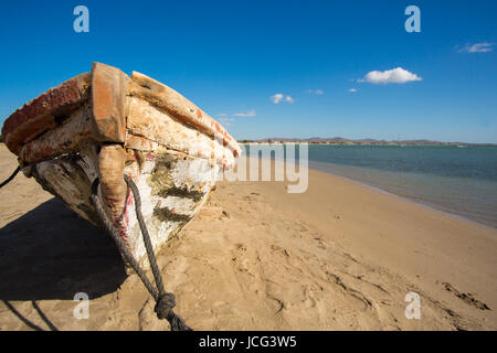 Colombia, wild coastal desert of Penisula la Guajira near the Cabo de la Vela resort. The picture present traditional fishing boat on the beach made of the one-piece tree. Colombia 2014. Stock Photo