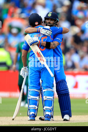 India's Rohit Sharma (left) and Virat Kohli (right) celebrate during the ICC Champions Trophy, semi-final match at Edgbaston, Birmingham. Stock Photo