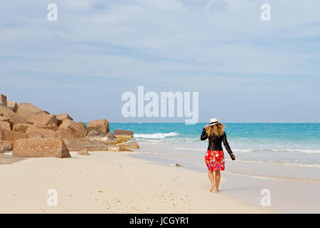 Lady walking in beach. North Coast. Egypt Stock Photo