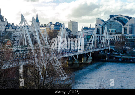 Hungerford and Golden Jubilee Bridges on the River Thames, London Stock Photo