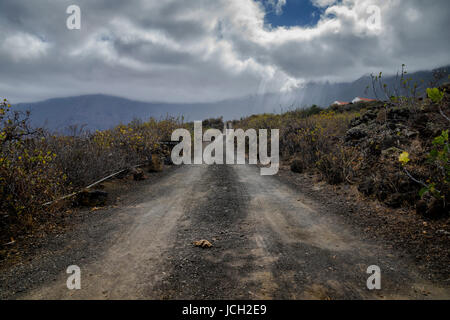 dusty road in el golfo valley, el hierro, canary islands, spain Stock Photo
