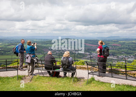 Enjoying the view over Monmouth and the distant Brecon Beacons from the Kymin viewpoint, Monmouthshire, Wales, UK Stock Photo