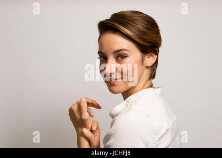 Shailene Woodley poses at the Four Seasons Los Angeles hotel on March 8, 2014 in Beverly Hills, California. Photo by Francis Specker Stock Photo