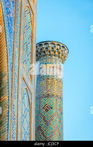 Minaret with blue mosaic tiles, Registan, Samarkand, Uzbekistan Stock Photo