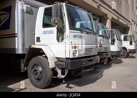 loading bays full of usps delivery trucks morgan general mail facility New York City USA Stock Photo