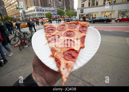 large single slice of pepperoni pizza New York City USA Stock Photo - Alamy