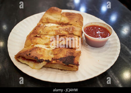 slice of pepperoni stromboli New York City USA Stock Photo