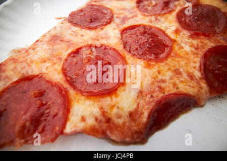 large single slice of pepperoni pizza New York City USA Stock Photo - Alamy