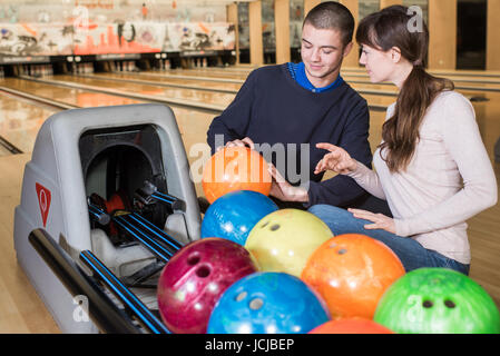 happy friends enjoying in bowling club Stock Photo