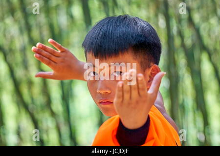Portrait of a young boy training Kung Fu, Shaolin Temple, China Stock Photo