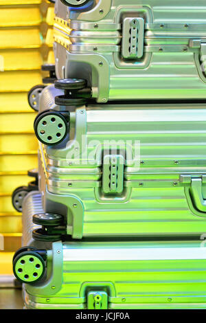 Aluminum suitcases with wheels and locks Stock Photo