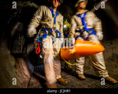 Crews practice trench, pipe, tunnel and confined space rescue at an industrial site. Stock Photo