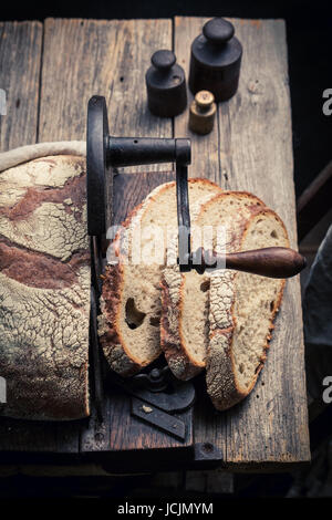 Bread slicer with big loaf stock image. Image of flour - 126603641