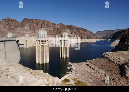 Hoover Dam on the Colorado River, Lake Mead. Penstock feed towers, USA Nevada border Stock Photo