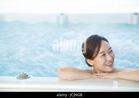 Portrait of smiling middle aged woman in spa Stock Photo