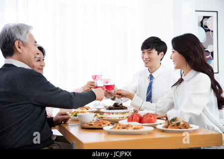 Harmonious family having meals Stock Photo