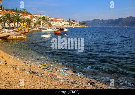 Beach polluted with plastic garbage due to sea currents, Korcula island, Croatia. Stock Photo