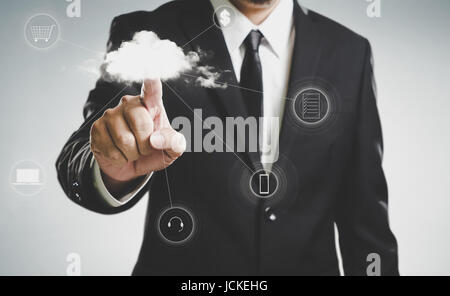 Businessmen press to the cloud server, the future network cloud services business concept . Stock Photo