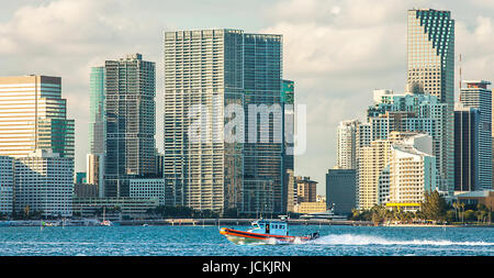 Boat of the Coast Guard in front of the skyline of Miami Florida USA Stock Photo