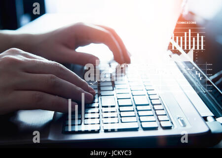Male hands on a laptop keyboard. computer laptop keyboard typing hand technology internet work concept Stock Photo