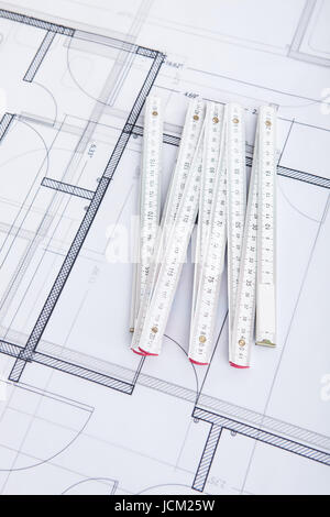 Closeup photo of folding ruler on blueprint Stock Photo
