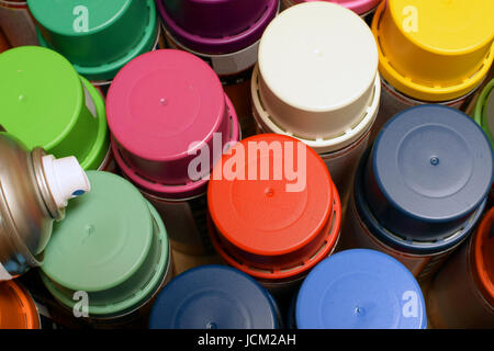 New spray paint cans. View from above. Stock Photo