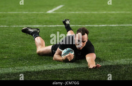 New Zealand's Israel Dagg scores their fifth try during the June International Test match at Eden's Park, Auckland. Stock Photo